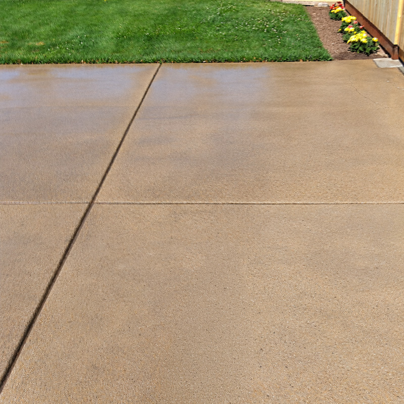 After: the same driveway pressure washed to an even, clean finish by S&S Mobile Pressure Washing